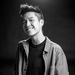 black and white of student brian tom.