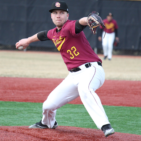 Ian Dinsmore pitches for the Oberlin varsity baseball team.