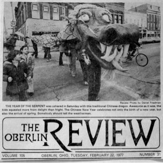 A newspaper photo of the dragon at a parade