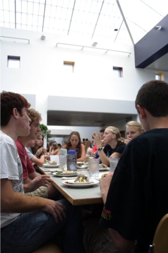 A group of students sitting at a table in Stevenson Dining Hall