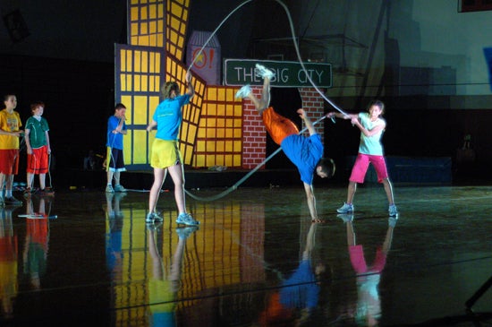 A performer does jump rope tricks