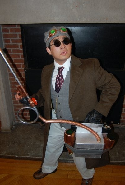  A student poses wearing a steam punk exterminator costume