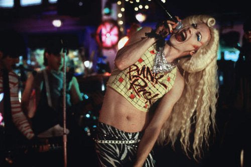 Punk singer in a long blond wig.