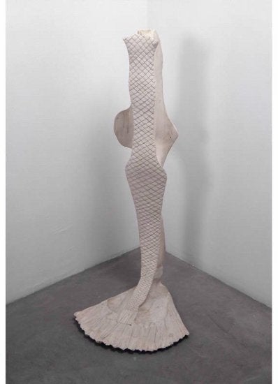 A sculpture slightly resembling a fish or mermaid fin