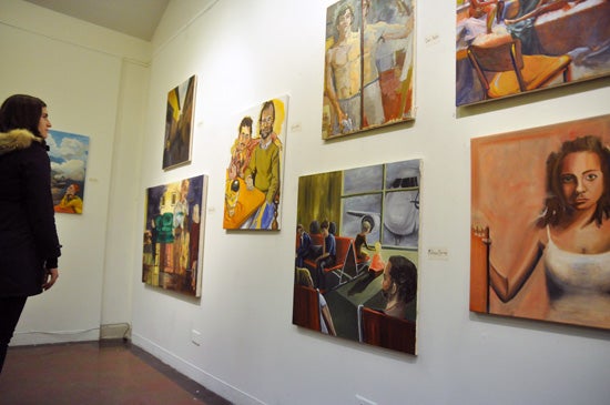 Paintings hung on a wall