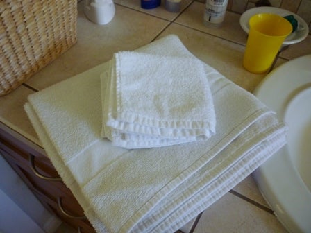 Folded towel and wash cloths