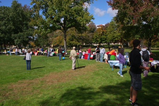 People gather in the park at Tappan Square