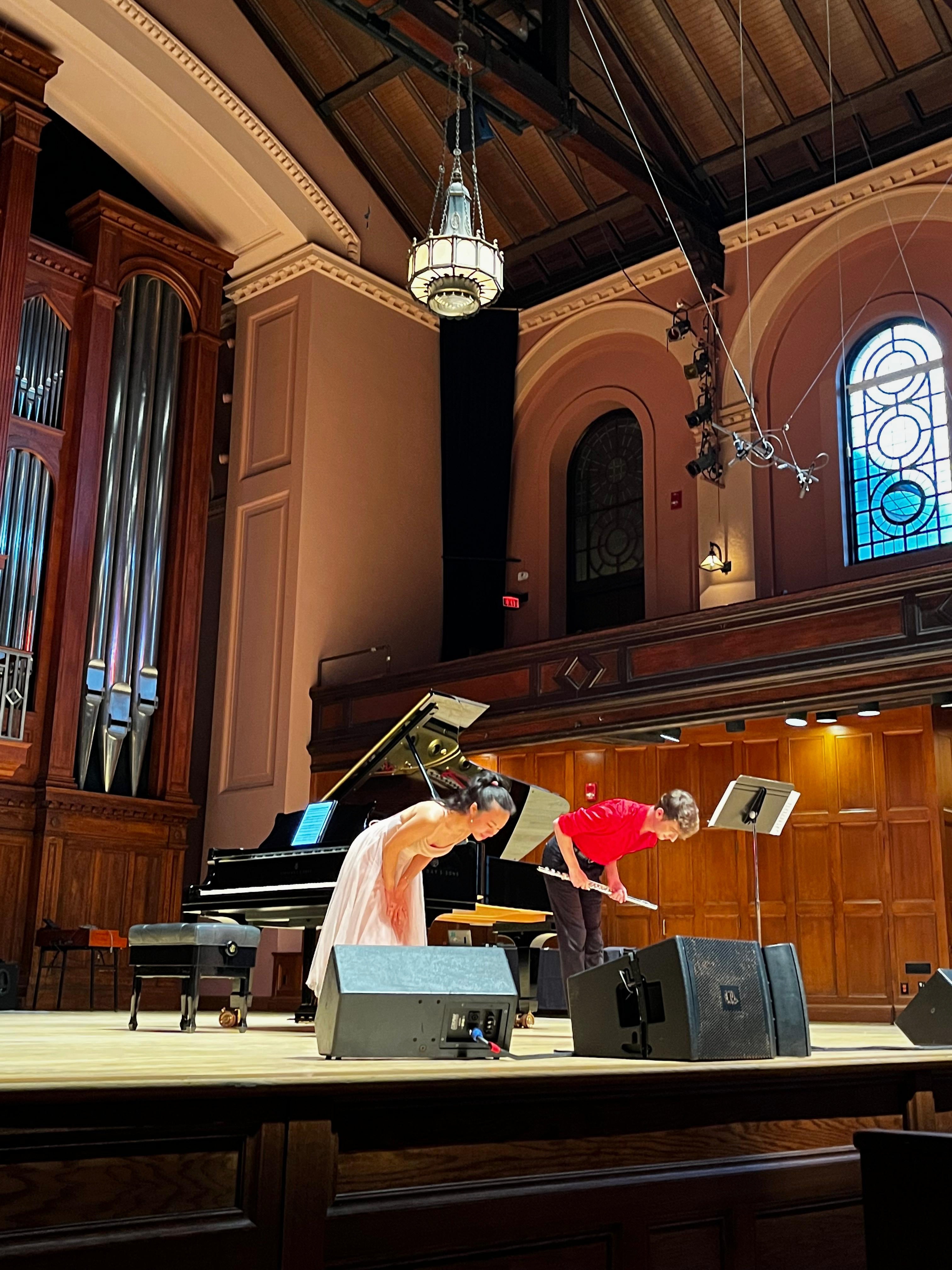 Myself and Michelle Jia Yun Xu bowing together in Finney Chapel.