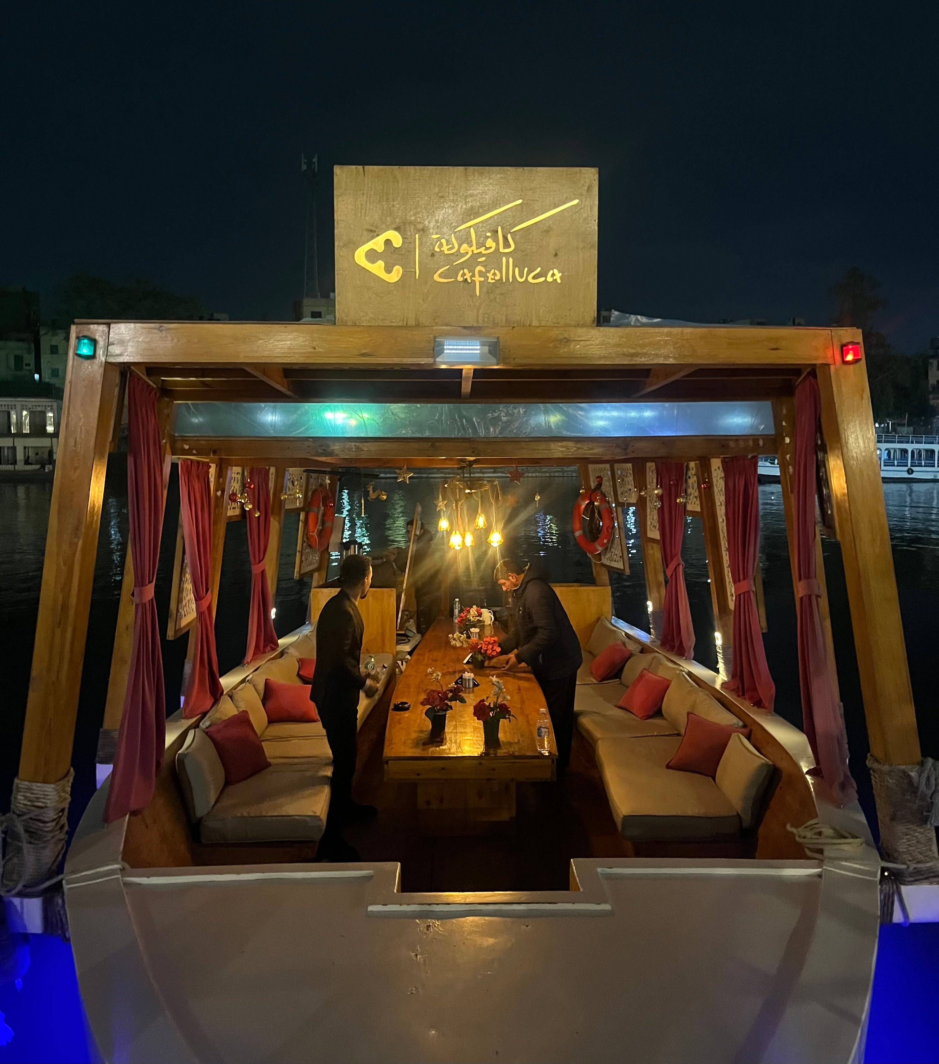 Restaurant on a felucca at night.