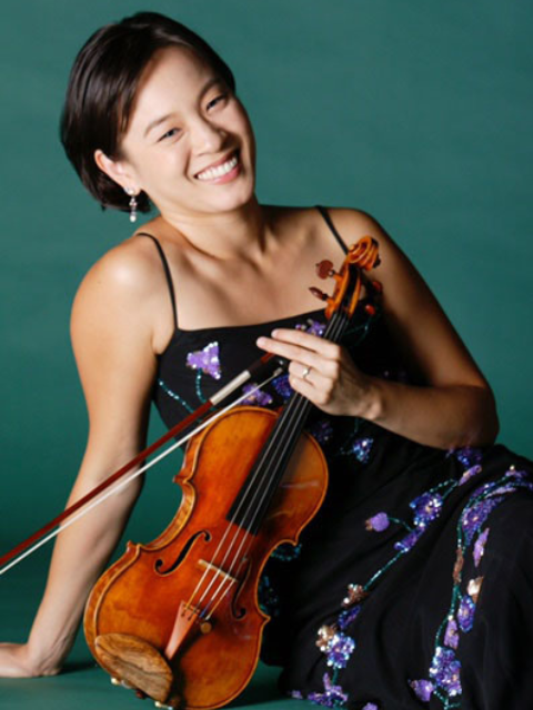 woman with dark hair holding violin