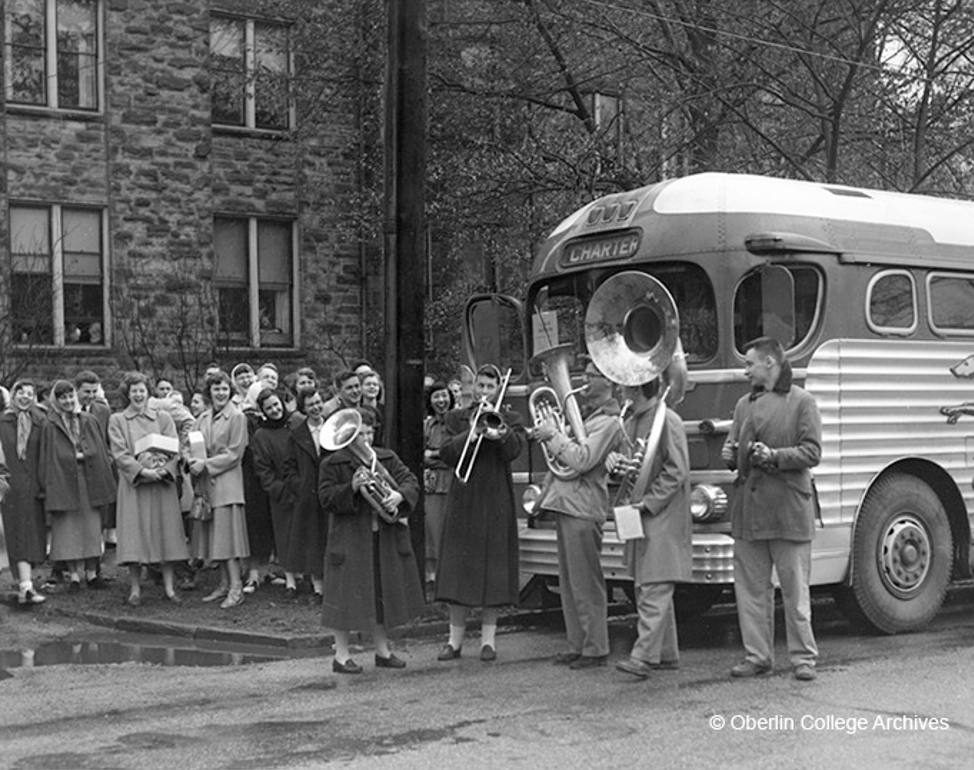 students boarding bus.