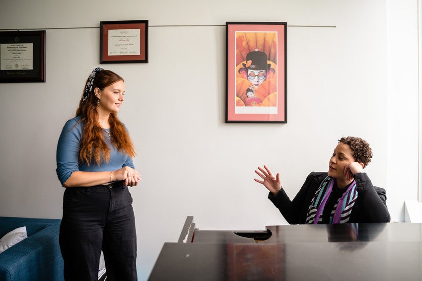 A female student in a voice lesson with Professor Katherine Jolly.