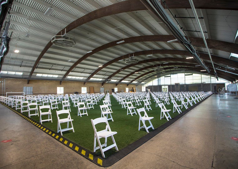 Rows of chairs in a dome shaped building