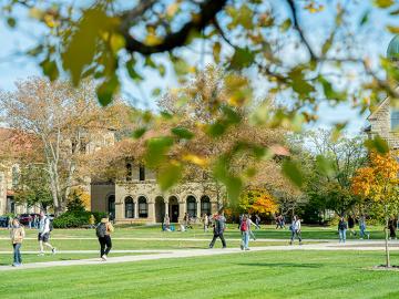 students walk on Oberlin's campus on a sunny autumn day