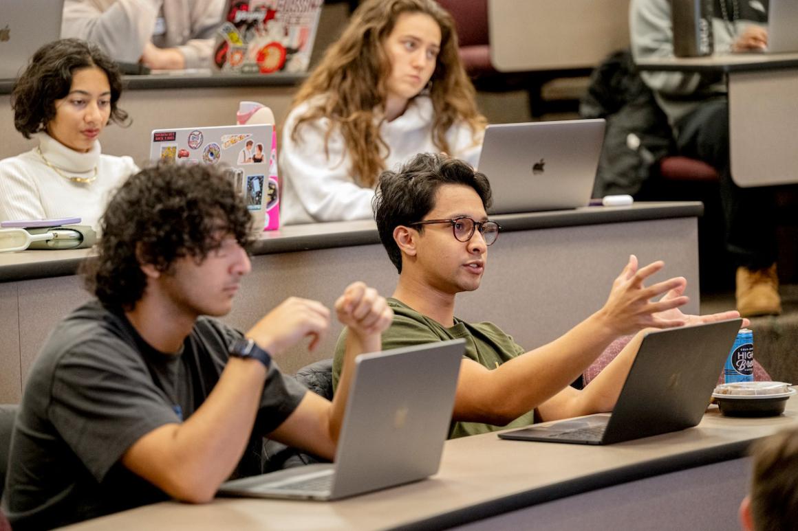 A student speaks up during a lecture.