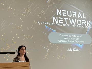 Aisha Muradi presents on Neural Networks in the Summer Research Institute Symposium