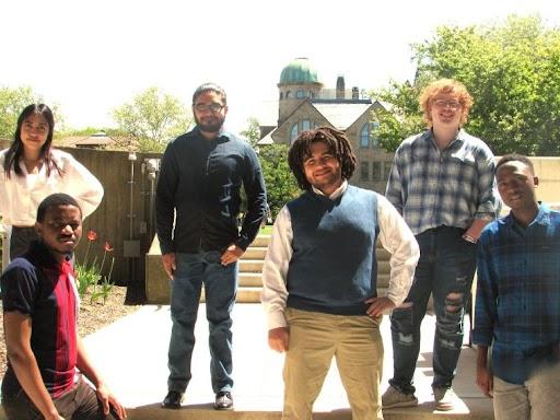 Picture of cohort standing on the steps