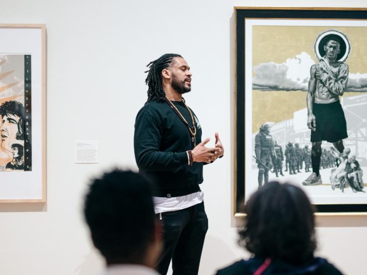 Michael Boyd Roman speaking at the Allen Memorial Art Museum