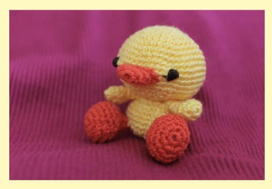 crocheted duck plush doll