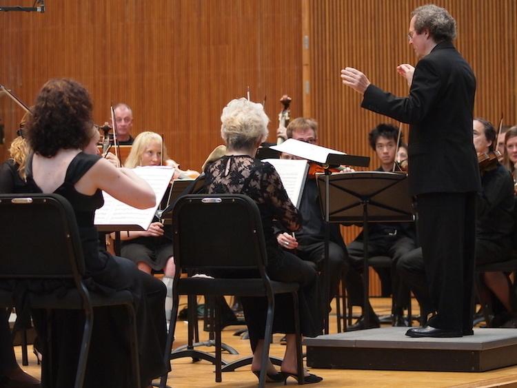Baroque orchestra with conductor