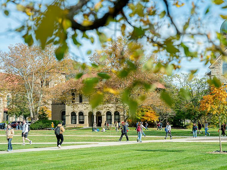 students walk on Oberlin's campus on a sunny autumn day